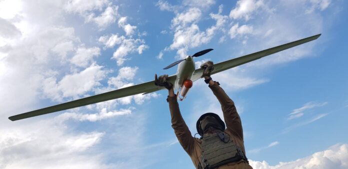 PUNISHER DRONE held by Ukrainian soldier